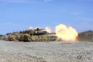 M1A1 Abrams fire their 120mm smoothbore cannon M1A1 Abrams fire their 120mm smoothbore cannon