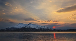 Midnight Sun over Tjeldsundet strait in Troms County, Norway Midnight Sun over Tjeldsundet strait in Troms County, Norway