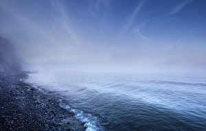 Misty seaside in the evening, Mons Klint cliffs, Denmark Misty seaside in the evening, Mons Klint cliffs, Denmark