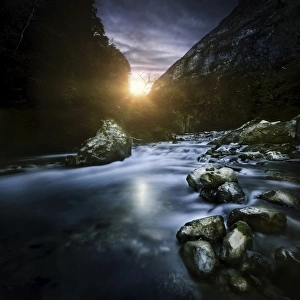 Mountain river at sunset, Ritsa Nature Reserve, Abkhazia, Georgia Mountain river at sunset, Ritsa Nature Reserve, Abkhazia, Georgia