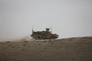An MRAP vehicle patrols the ridge of a wadi near Kunduz, Afghnanistan An MRAP vehicle patrols the ridge of a wadi near Kunduz, Afghnanistan