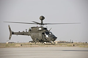 An OH-58D Kiowa helicopter takes off from COB Speicher An OH-58D Kiowa helicopter takes off from COB Speicher