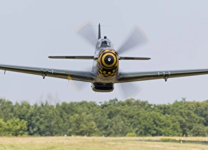 A P-51 Mustang flies by at East Troy, Wisconsin A P-51 Mustang flies by at East Troy, Wisconsin