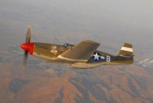 P-51C Mustang flying over Chino Hills, California P-51C Mustang flying over Chino Hills, California