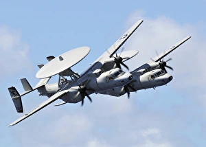 A pair of E-2C Hawkeyes in flight over the Pacific Ocean A pair of E-2C Hawkeyes in flight over the Pacific Ocean