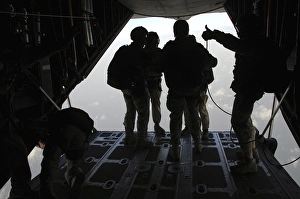 Pararescuemen prepare for a HALO jump aboard an HC-130 over Djibouti Pararescuemen prepare for a HALO jump aboard an HC-130 over Djibouti