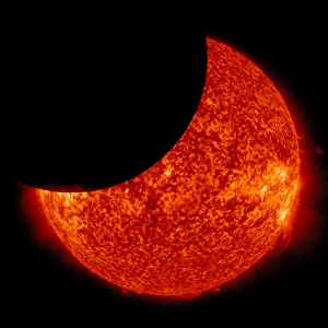 Partial Solar Eclipse Prints: A partial solar eclipse from space