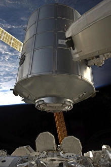 International Space Station Prints: The Permanent Multipurpose Module in the grasp of Canadarm2