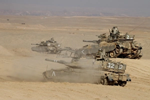A platoon of Israel Defense Force Merkava Mark IV main battle tanks A platoon of Israel Defense Force Merkava Mark IV main battle tanks