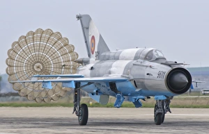 A Romanian Air Force MiG-21C with parachute deployed A Romanian Air Force MiG-21C with parachute deployed
