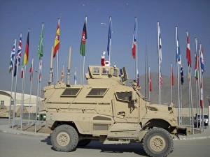 Santa tosses candy from a MaxxPro Mine Resistant Ambush Protected vehicle Santa tosses candy from a MaxxPro Mine Resistant Ambush Protected vehicle