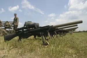 Images Dated 9th July 2006: Scout Snipers line up their new MK-11 sniper rifles