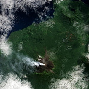 A small plume rises from the summit of Ulawun Volcano on Papua New Guineaas island A small plume rises from the summit of Ulawun Volcano on Papua New Guineaas island