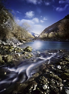 Small stream flowing into the mountain river, Ritsa Nature Reserve Small stream flowing into the mountain river, Ritsa Nature Reserve