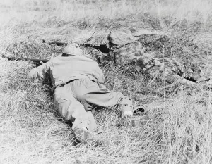 WWII Military Photography Prints: Two snipers blending in with their terrain