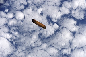 The space shuttles external fuel tank falls toward Earths atmosphere The space shuttles external fuel tank falls toward Earths atmosphere