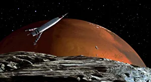 A spaceship in orbit over Mars moon, Phobos, with the red planet Mars in the background A spaceship in orbit over Mars moon, Phobos, with the red planet Mars in the background