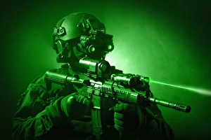 Special operations forces soldier equipped with night vision and an HK416 assault rifle Special operations forces soldier equipped with night vision and an HK416 assault rifle