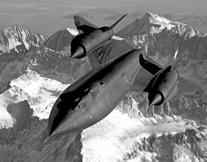 A SR-71B Blackbird flying across the Sierra Nevada Mountains A SR-71B Blackbird flying across the Sierra Nevada Mountains