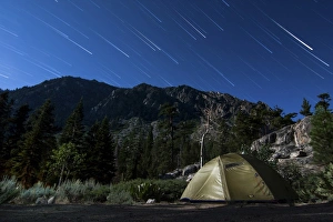Star trails and a lone tent in the Inyo National Forest, California Star trails and a lone tent in the Inyo National Forest, California