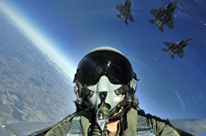 A three-ship formation of F-15E Strike Eagle aircraft A three-ship formation of F-15E Strike Eagle aircraft
