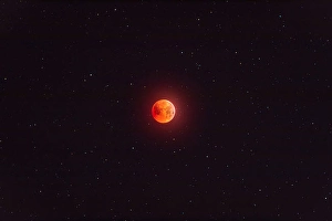 Total Lunar Eclipse Prints: Totally eclipsed moon in starfield