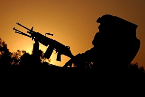 Traffic ceases at the Iraq border at sunset during Operation Iraqi Freedom Traffic ceases at the Iraq border at sunset during Operation Iraqi Freedom