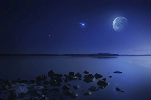 Tranquil lake against starry sky, moon and falling meteorite, Finland Tranquil lake against starry sky, moon and falling meteorite, Finland