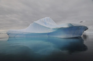 Translucent blue iceberg reflection, Antarctica Translucent blue iceberg reflection, Antarctica