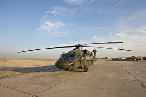 A UH-60 Black Hawk parked at a military base in Tikrit, Iraq A UH-60 Black Hawk parked at a military base in Tikrit, Iraq