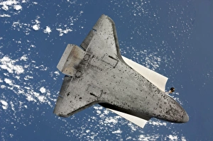 NASA Space Exploration Images Prints: The underside of space shuttle Discovery