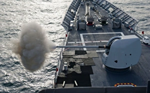 USS Cape St. George fires its MK-45 lightweight 5-inch gun USS Cape St. George fires its MK-45 lightweight 5-inch gun