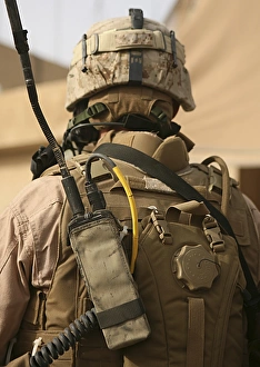 A vehicle commander with his radio equipment attached to his vest A vehicle commander with his radio equipment attached to his vest