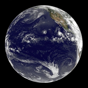 View of Earth showing three tropical cyclones in the Pacific Ocean View of Earth showing three tropical cyclones in the Pacific Ocean