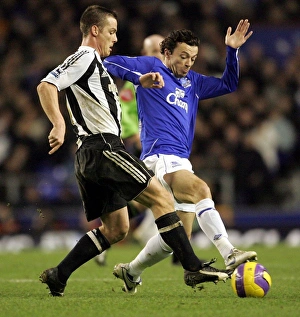 Everton v Newcastle United Simon Davies tackles Newcastles Scott Parker Everton v Newcastle United Simon Davies tackles Newcastles Scott Parker