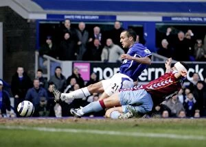 Images Dated 18th March 2006: Leon Osman Slides In to Score Everton's Third Goal Against Aston Villa