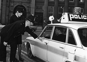 Policeman and policewoman with police car, Sheffield, 1972 Policeman and policewoman with police car, Sheffield, 1972