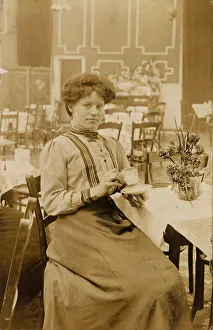 Woman drinking in the cafe at the Olympia Skating Rink, Sheffield, c. 1911 Woman drinking in the cafe at the Olympia Skating Rink, Sheffield, c. 1911