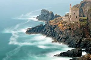 Abandoned tin mineshafts above rugged coastal rocks. Botallack Head, near St Just Abandoned tin mineshafts above rugged coastal rocks. Botallack Head, near St Just