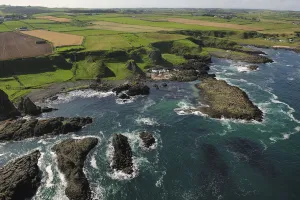 Aerial view to the west of Portbraddan on the north coast of County Antrim Aerial view to the west of Portbraddan on the north coast of County Antrim