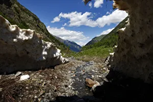 Alibek valley near Dombay seen from inside an ice-cave, Teberdinsky biosphere reserve Alibek valley near Dombay seen from inside an ice-cave, Teberdinsky biosphere reserve