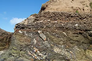 Western Europe Geology Prints: An angular unconformity between folded Devonian age mudrocks and Quaternary age conglomerate