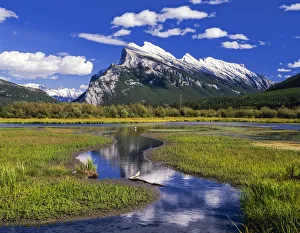 Canadian Rockies reflected in marshland, Banff National Park, Alberta, Canada Canadian Rockies reflected in marshland, Banff National Park, Alberta, Canada