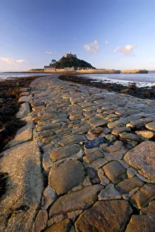 Causeway out to St Michaels Mount exposed at low tide, Cornwall, UK Causeway out to St Michaels Mount exposed at low tide, Cornwall, UK