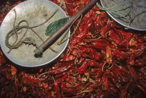 Chillies & weigh scale at Thimphu market, capital city Central Bhutan Chillies & weigh scale at Thimphu market, capital city Central Bhutan