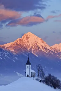 Church of St. Primoz with the Kamnik-Savinja Alps beyond,. January 2010 Church of St. Primoz with the Kamnik-Savinja Alps beyond,. January 2010