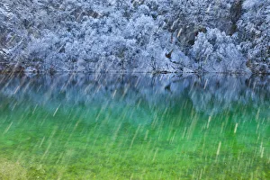 Colourful water with reflections in snow, Plitvice Lakes National Park, Lika, Croatia Colourful water with reflections in snow, Plitvice Lakes National Park, Lika, Croatia