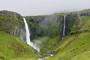 Grundarfoss waterfalls, Snaefellsness Peninsula, Iceland. July Grundarfoss waterfalls, Snaefellsness Peninsula, Iceland. July
