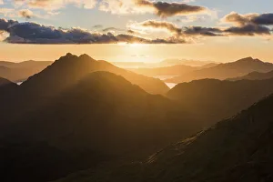 Knoydart and Loch Nevis from Sgurr Cos na Breachd-laoidh with sun shining through cloud Knoydart and Loch Nevis from Sgurr Cos na Breachd-laoidh with sun shining through cloud