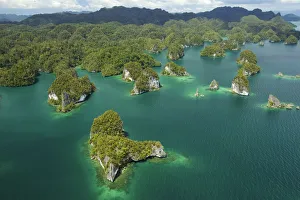 Limestone Islands in the Northern part of Kabui Bay. Waigeo Island at the top Limestone Islands in the Northern part of Kabui Bay. Waigeo Island at the top